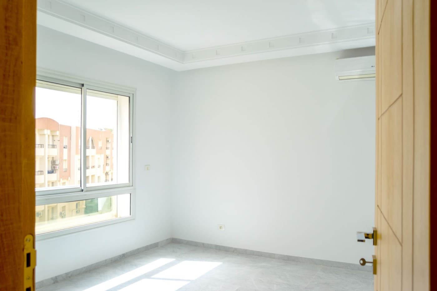 Omrane 12 Residence — Light-filled bedroom